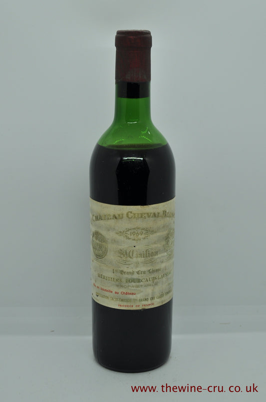 1969 vintage red wine. Chateau Cheval Blanc, Bordeaux, France. The capsule is good. The label abin soiled and the wine level is mid shoulder. Immediate delivery. Free local delivery. Gift wrapping available.