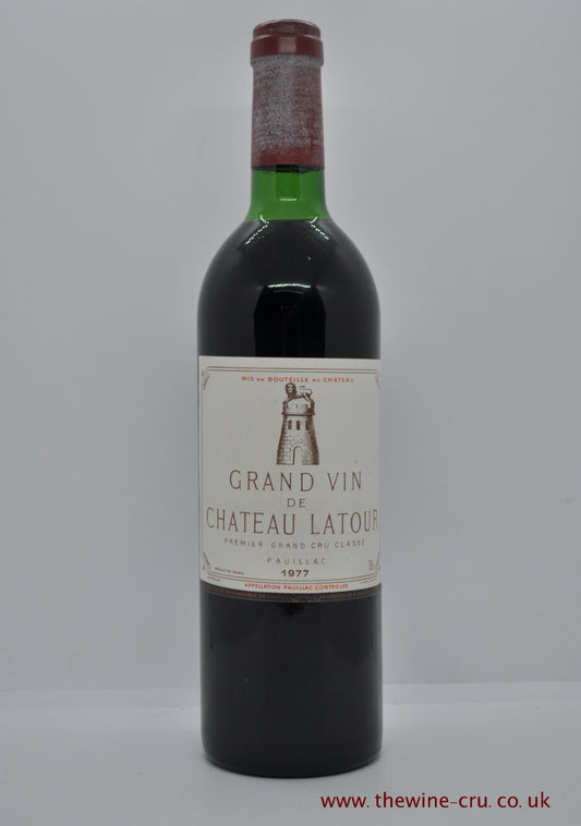 1977 vintage red wine. Chateau Latour 1977. France, Bordeaux. Capsule a little faded. Good label and wine level very top shoulder. Immediate delivery. Free local deliver. Gift wrapping available.