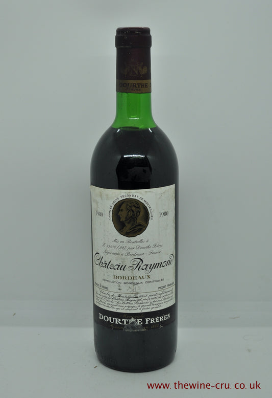 1980 vintage red wine. Chateau Raymond 1980. France, Bordeaux. The bottle is in good condition generally with the wine level being top shoulder. Immediate delivery. Free local delivery. Gift wrapping available.