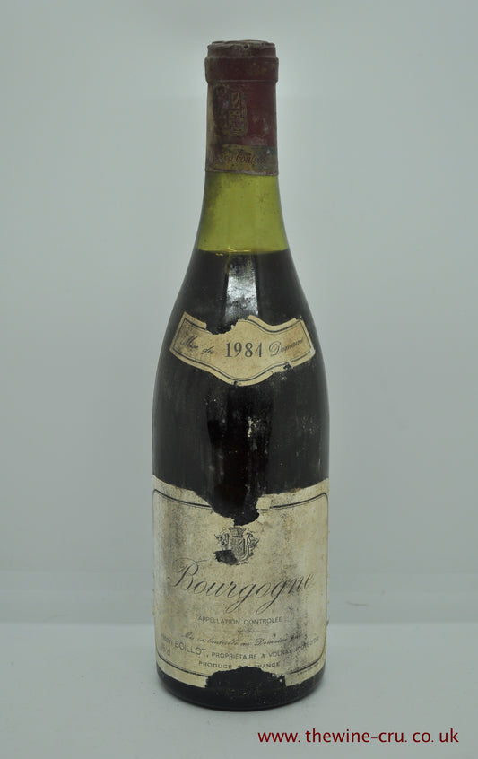 1984 vintage red wine. Bourgogne  Henri Boillot. France Burgundy.  The capsule is a little corroded . The label tatty and bin soiled. The wine level is 3cm below base of cork. Immediate delivery. Free local delivery. Gift wrapping available.
