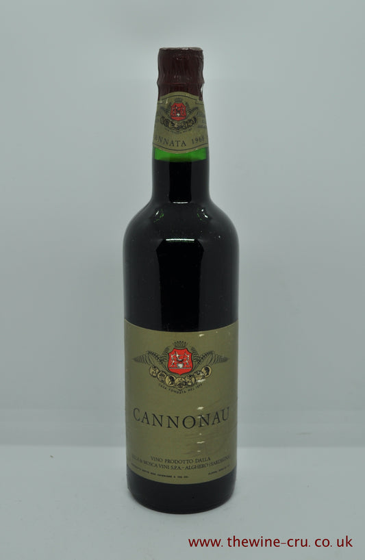 A bottle of 1968 vintage red wine. Cannonau Sella & Mosca Vini. Sardinia. The bottle is in good condition with the level being in neck. Immediate delivery. Free local delivery. Gift wrapping available.