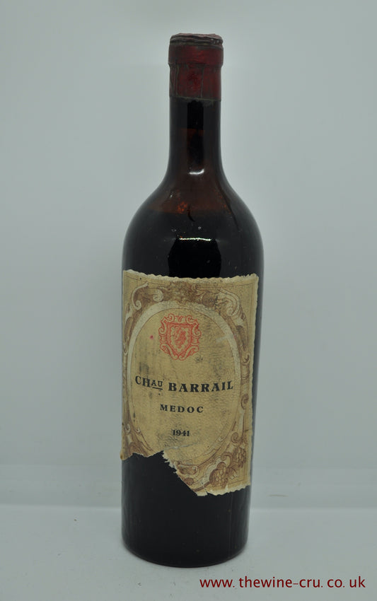 1941 vintage red wine. Chateau Barrail, France, Bordeaux. The capsule has some corrosion . The label bin soiled and torn. The wine level is mid/high shoulder. Immediate delivery. free local delivery. Gift wrapping available.