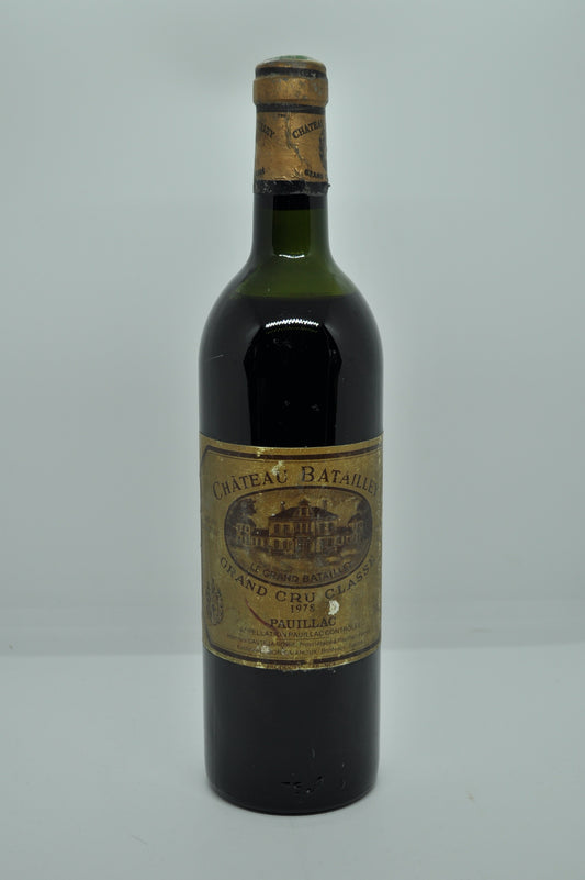 1978 vintage red wine. Chateau Batailley 1978, France, Bordeaux. Capsule is a little corroded the label bin soiled and the wine level is high shoulder. Immediate delivery. Free local delivery. Gift wrapping available.