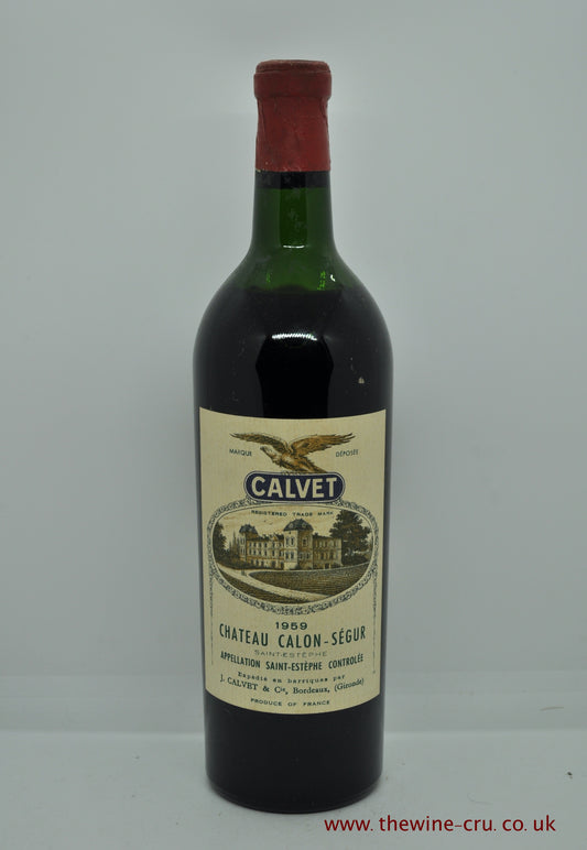 1959 vintage red wine. Chateau Calon Segur 1959. Bordeaux, France. The bottle is in good condition for its age with the wine level being high shoulder. Immediate delivery. free local delivery. Gift wrapping available.