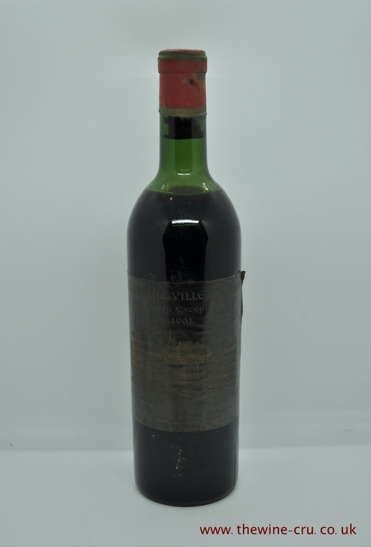 a bottle of 1961 vintage red wine from Chateau De Villegeorge, Bordeaux, France. The label is a little faded and the wine level is top shoulder. Immediate delivery. Free local delivery. Gift wrapping available.