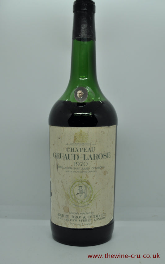 A magnum bottle of 1970 vintage red wine. from Chateau Gruaud Larose, Bordeaux, France. The magnum bottle is in good condition with the wine level just below the emblem. Immediate delivery. Free local delivery. Gift wrapping available.
