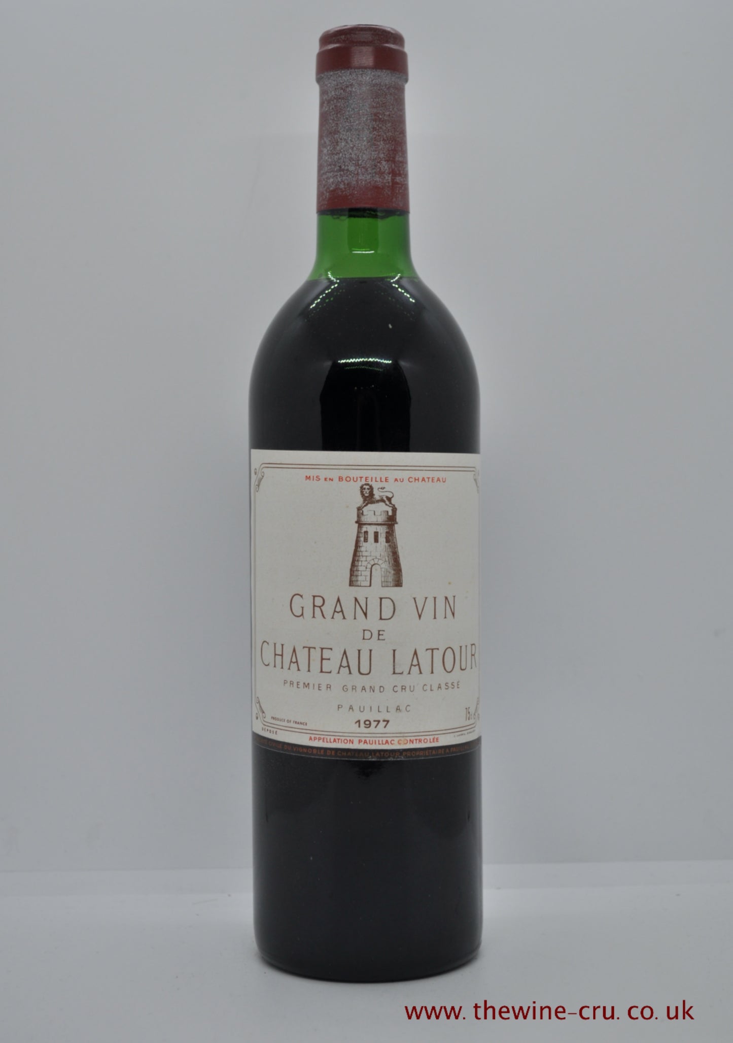 1977 vintage red wine. Chateau Latour 1977. France, Bordeaux. Capsule a little faded. Good label and wine level very top shoulder. Immediate delivery. Free local deliver. Gift wrapping available.