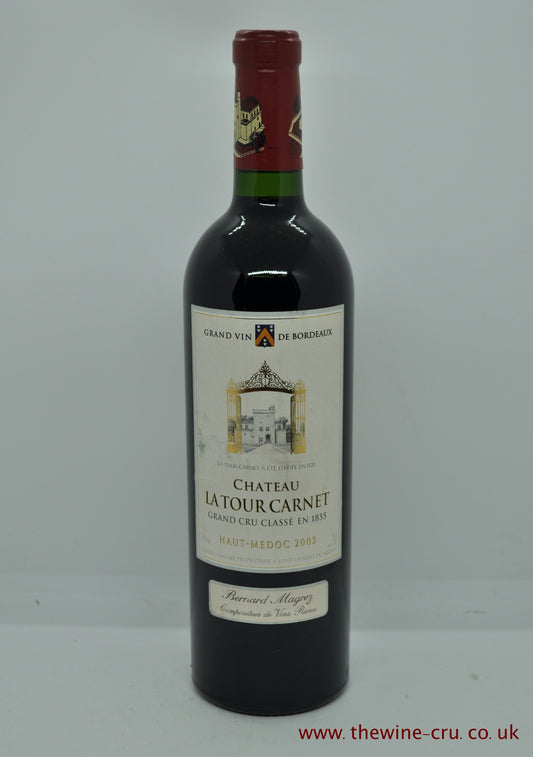 A bottle of 2003 vintage red wine. Chateau La Tour Carnet 2003. Bordeaux, France. The bolltle is in very good condition with the wine level being into the neck. Immediate delivery available. Free local delivery. Gift wrapping available.