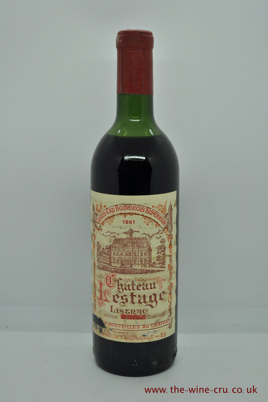1961 vintage red wine. Chateau Lestage 1961, Bordeaux, France. The capsules are ok, labels good with a few nicks. The wine level is top shoulder or better. Immediate delivery. free local delivery. Gift wrapping available.
