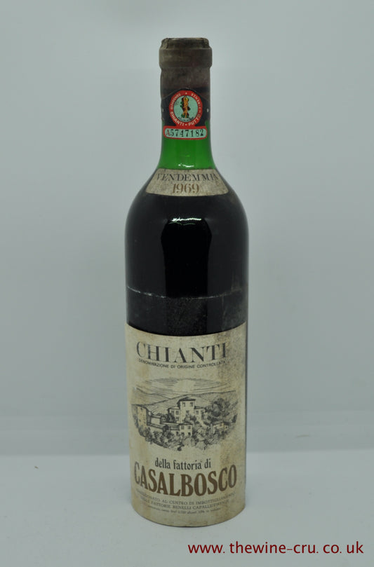 A bottle of 1969 vintage red wine. Chianti Fattoria Casalbosco. Italy. The bottle is in general good condition with the wine level being top shoulder. The label is loose. Immediate delivery. Free local delivery. Gift wrapping available.