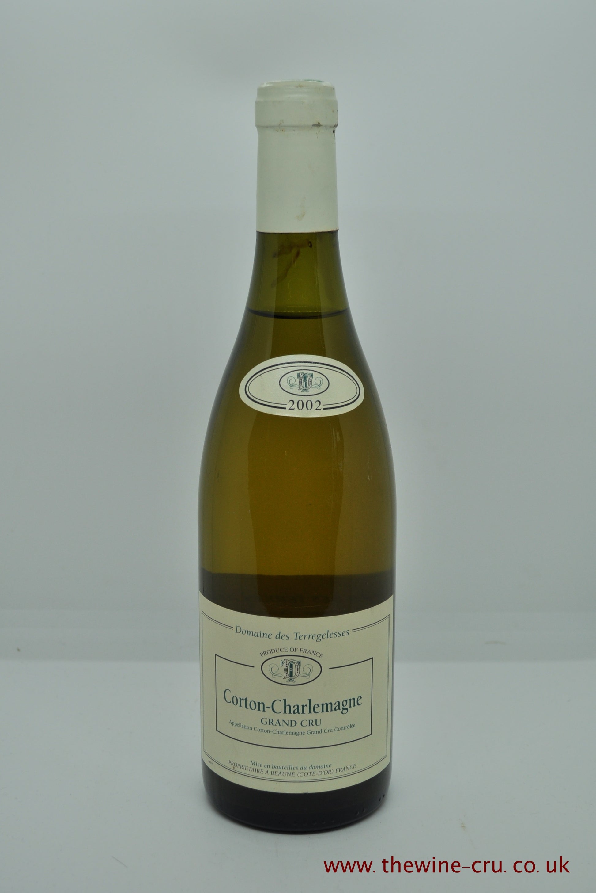 2002 vintage white wine. Domaine des Terregelesses Corton Charlemagne Grand Cru 2002. France Burgundy.  The bottle is in good condition with the level being  3cm below base of cork. Immediate delivery. free local delivery. Gift wrapping available.