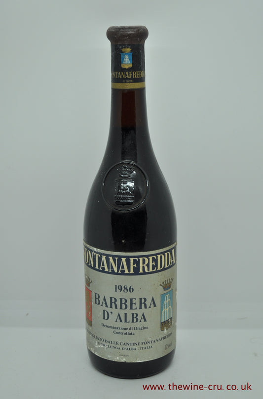 1986 vintage red wine. Fontanafredda Barbera D'Alba 1986. The bottle is in good general condition with the wine level being 3cm below the base of cork. Immediate delivery. Free local delivery. Gift wrapping available.