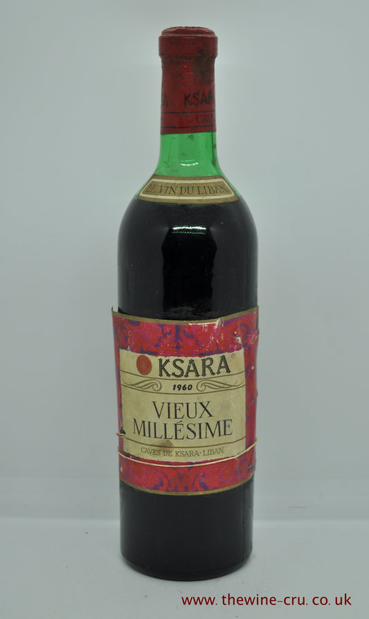 1960 vintage red wine. Ksara Vieux Millesime, Lebanon. The label is complete but loose and the level is mid shoulder. Immediate delivery. Free local delivery. Gift wrapping available.