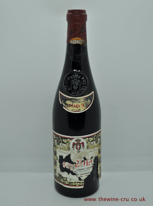 1965 vintage red wine. Luigi Calissano & Figli Barolo 1965. Italy. The label is badly bin soiled with bits missing. The vintage is legible on the neck label. The wine level is 3cm below the base of the cork. Immediate delivery. Free local delivery. Gift wrapping available.