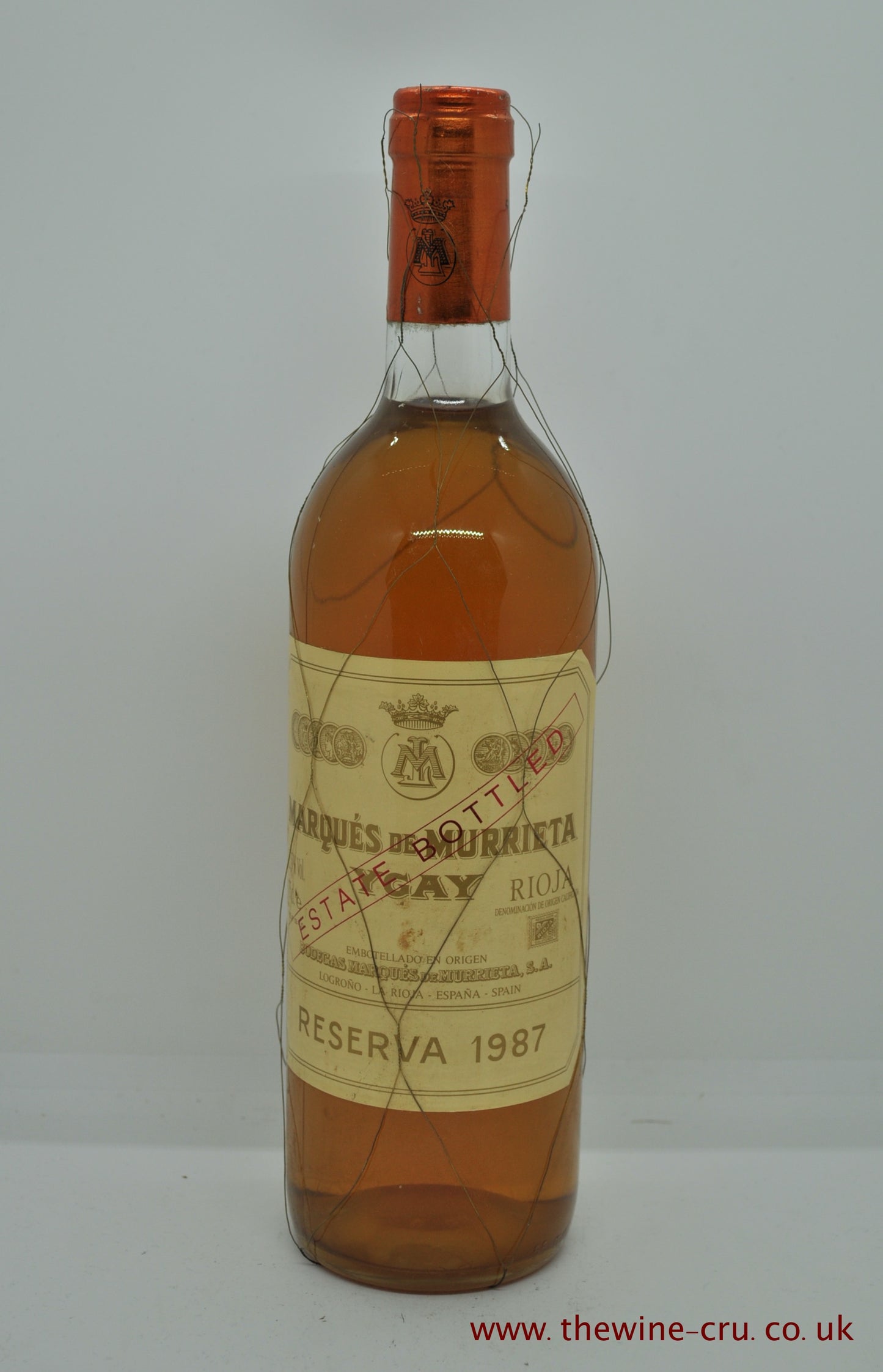 1987 vintage white wine. Marques de Murrieta Ygay reserva blanco. Spain. The bottle is in good condition generally . Wire mesh is still attached with breaks in it and the level of the wine is base of neck. Immediate delivery. Free local delivery. Gift wrapping available.