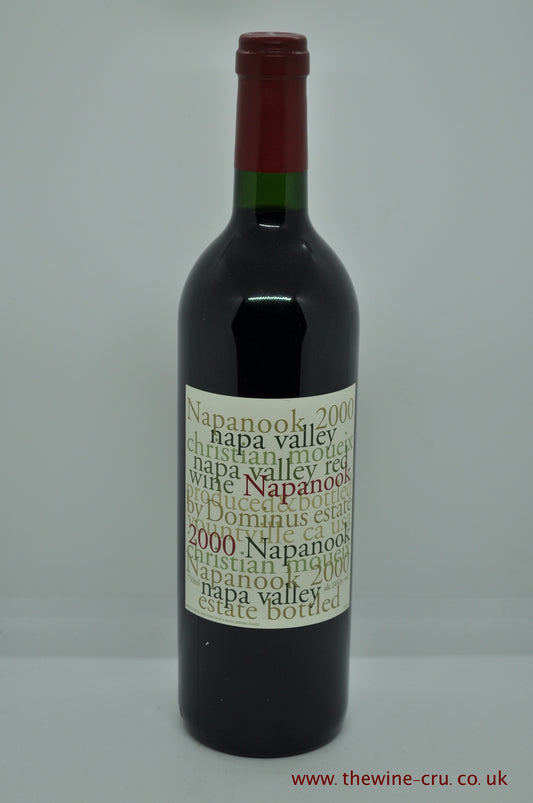 a bottle of 1999 vintage red wine. Napanook from the Dominus Estate in Napa Valley, California. Capsule and label are good and the wine level is at the base of the neck. Immediate delivery. Free local delivery. Gift wrapping available.