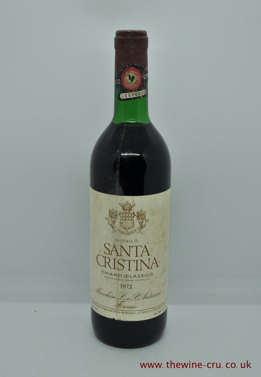A bottle of 1972 vintage red wine. Santa Cristina Chianti Classico 1972. Italy. The bottle is in good condition with the wine level being very top shoulder. Immediate delivery. Free local delivery. Gift wrapping available.