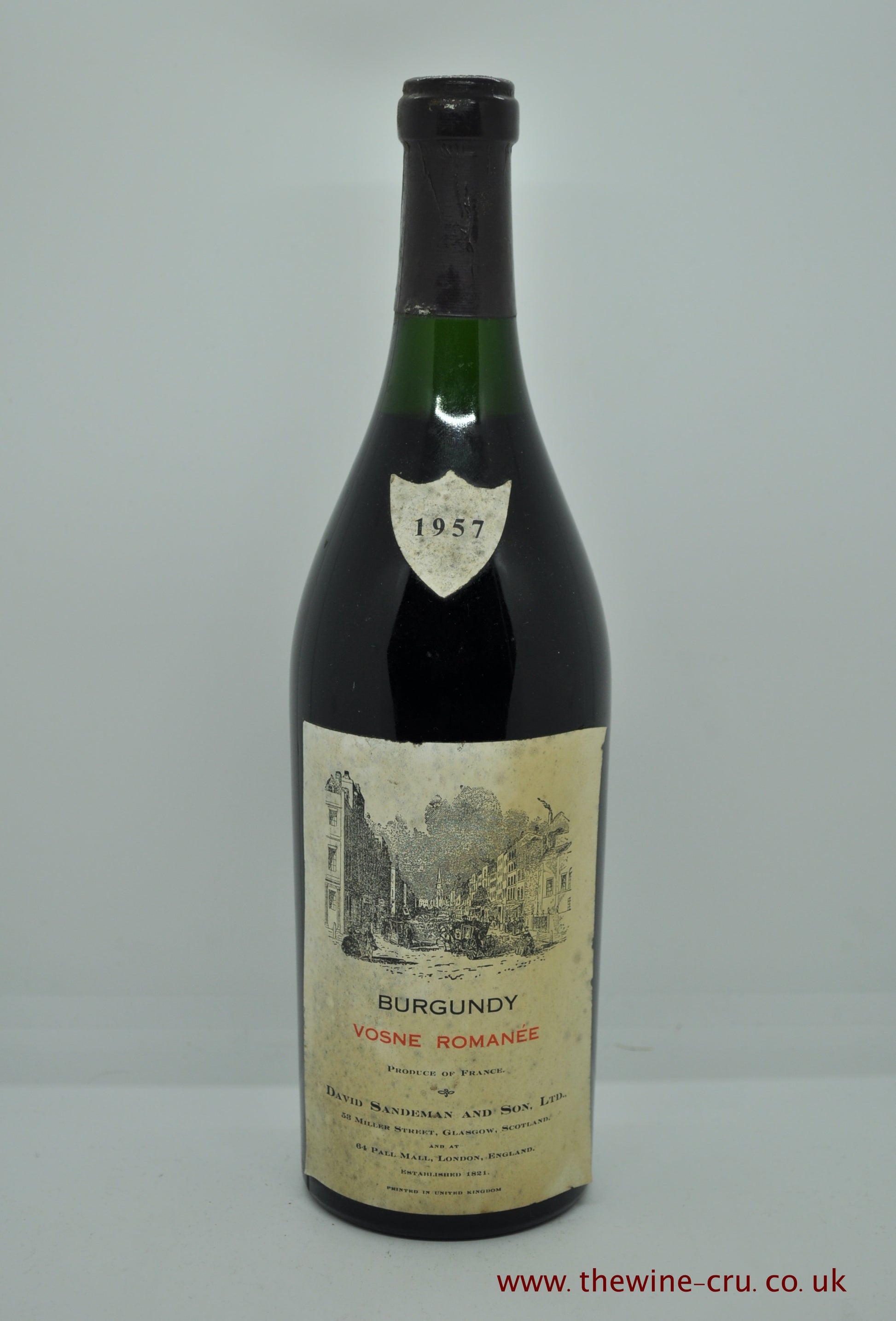 1957 vintage red wine. Vosnee Romanee , shipped by British merchant David Sandeman and Sons Ltd. The bottle is in good condition with the wine level about 3cm below the cork. Immediate delivery. Free local delivery. Gift wrapping available.